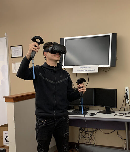 student immersed in vr